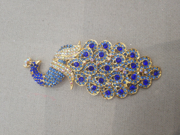 Broche Paon bleu roi